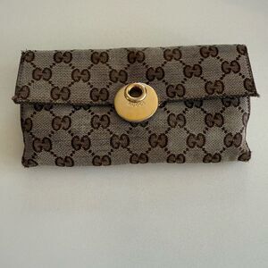 Gucci Brown Monogram Wristlet with Gold Accent